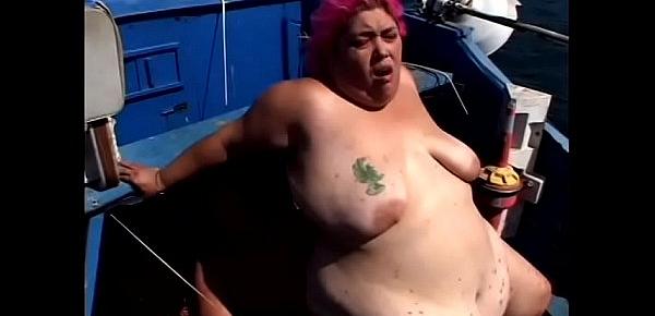  Redhead BBW SinDee Williams gets drilled doggy style on a boat